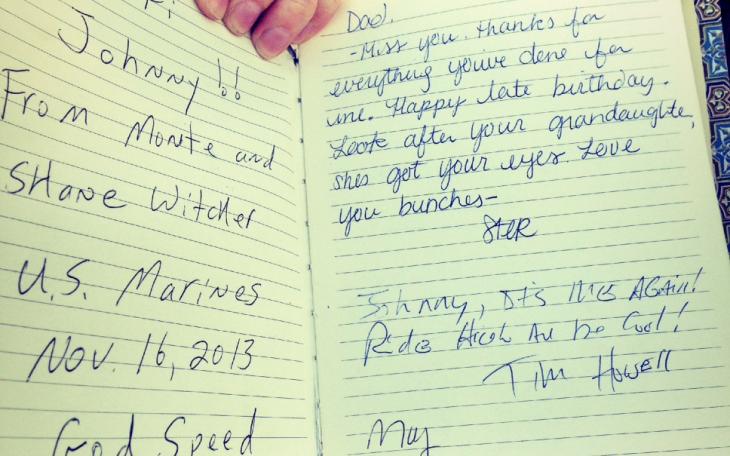 Notes from family, friends and strangers fill the pages of a book attached to a roadside memorial just outside Tom Green County. (LIVE! Photo/Chelsea Reinhard)