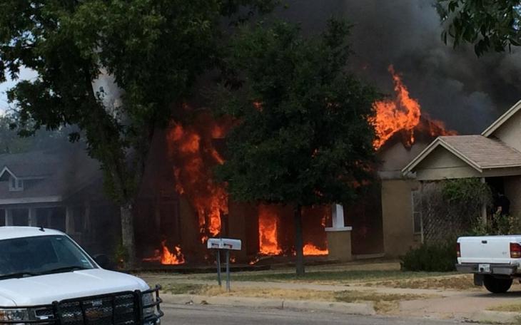 The fire fully engulfed a duplex residential building. (LIVE! Photo/John Basquez)