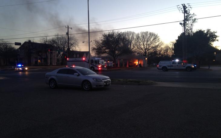 A fire burns near the YMCA building downtown. (LIVE! Photo by Hayden Hyde)