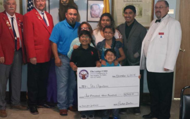 Elks Lodge #1880 presents a check to the family of Bianca Aguilar. (Contributed/Harry Thomas)