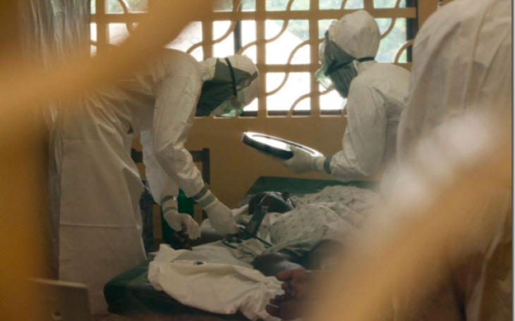 Suits, face masks and gloves were part of the daily attire in Monrovia, where Kent Brantly treated those infected with the Ebola virus. (Contributed Photo)