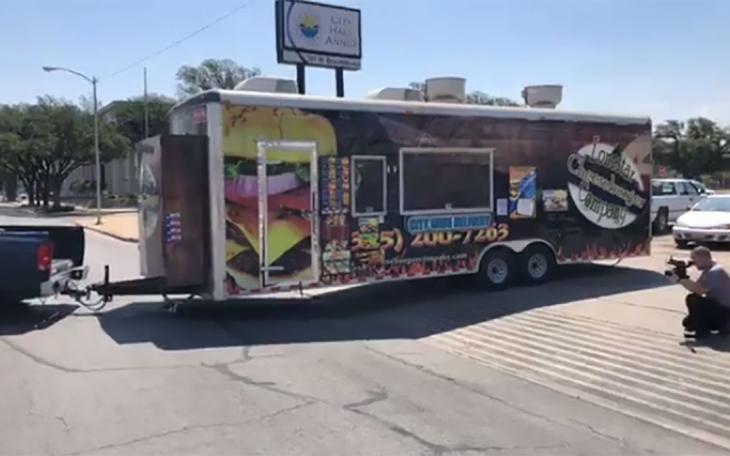 The City of San Angelo forced the Lonestar Cheeseburger Co. to prove its trailer was truly mobile by having the proprietor tow the trailer around the block.