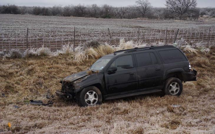 An SUV rollover crash on US 87 at 10 a.m. Jan. 2, 2015. (LIVE! Photo/John Basquez)