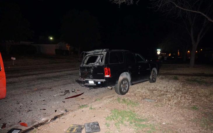 Driver flees on foot after slamming into parked Escalade on Southland neighborhood street. (LIVE! Photo/John Basquez)