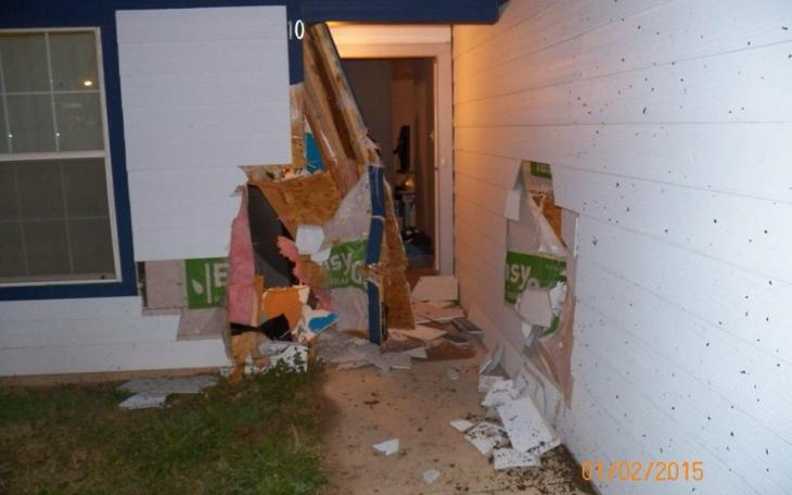 Damage to the exterior of the house after the crash. (Contributed Photo)