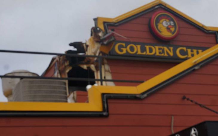 Golden Chick's roof had an access hole knocked out of the roof. (LIVE! Photo/John Basquez)