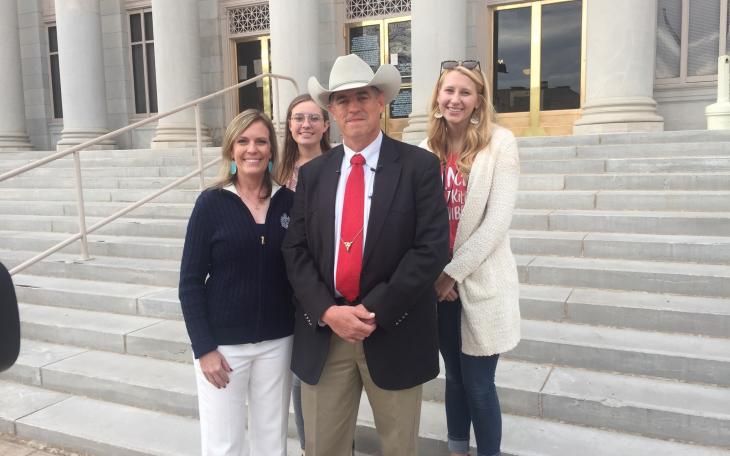 Nick Hanna (in hat) with his family