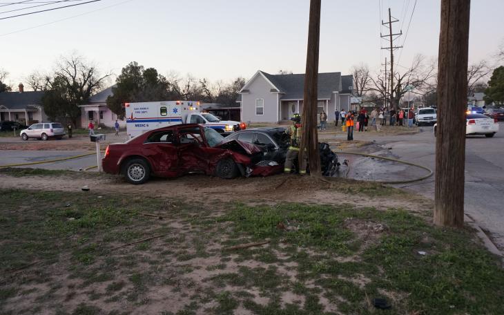 A wide view of the crash scene just after firemen extinguished the fire that engulfed the engine compartment of the Chevy Malibu. (LIVE! Photo/Joe Hyde)