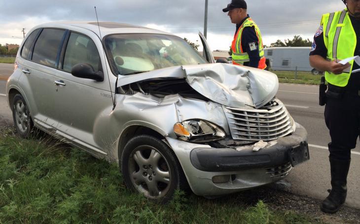 A PT Cruiser and Dodge flatbed pickup crashed this morning on Loop 306. Oct. 2, 2014. (LIVE! Photo/John Basquez)