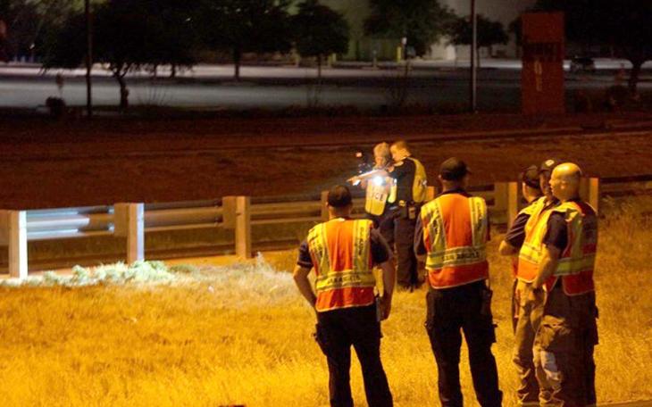 San Angelo police investigators on Loop 306 investigating the fatal motorcycle crash. (LIVE! Photo/John Basquez)