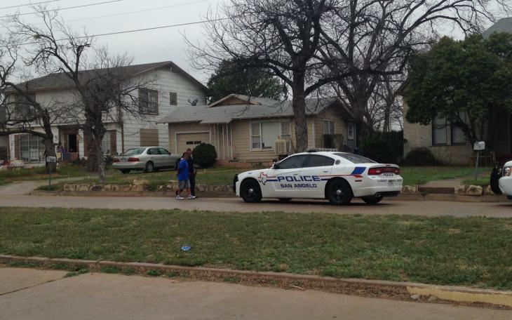 Officer Abel Nandin walks a juvenile to his patrol car, carrying a BB gun in the other hand on the 600 block of Preusser.