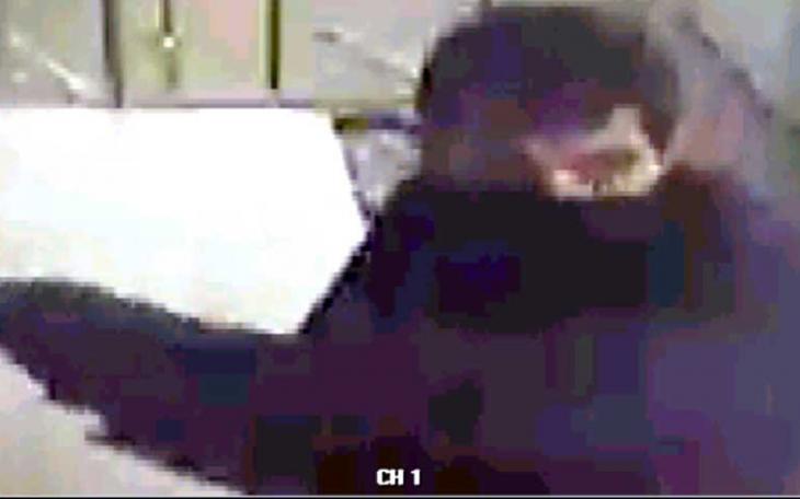 The coin machine murder in progress.