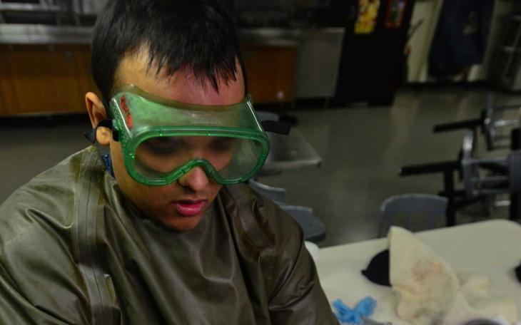 BERMERTON, Wash. (Feb. 27, 2015) Aviation Ordnanceman Airman Michael Williams, from San Angelo, Texas, pumps lube oil into an oil sump aboard USS John C. Stennis (CVN 74). Stennis is currently undergoing an operational training period.