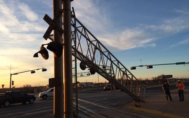 Railroad crossing lights were downed by an over-sized load on Jan. 15, 2015. (LIVE! Photo/John Basquez)