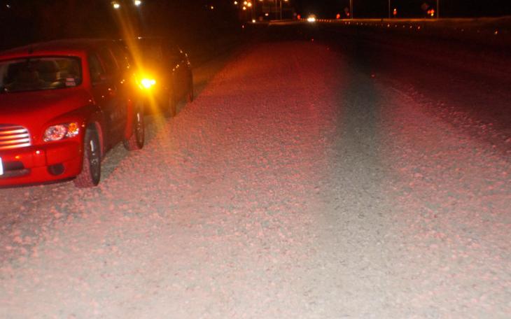 At first glance at night, it appears to be a gravel road. But this is a layer of gravel dropped here by a sandtruck on a paved access road to a freeway. (LIVE! Photo/John Basquez)