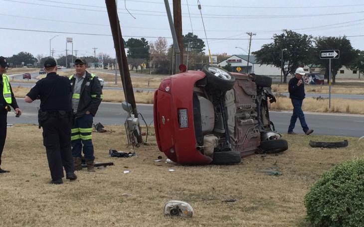 Rollover crash in front of Sitel on Dec. 7, 2014. (LIVE! Photo/John Basquez)