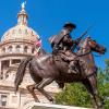 The Texas Capitol behind the Terry's Texas Rangers Monument