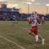 Ballinger's Hunter Kresta races down the sideline for a 64-yard touchdown catch in the Bearcats' 61-6 win over San Angelo TLCA on Friday, Sept. 13, 2024, at Lake View Stadium.