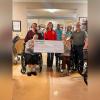 From left to right, back row: Christine Timms, Sealie Hughes, Ray Watt. Front row: Sondra and Beverly, residents of San Angelo Nursing and Rehab, hold the $1,000 scholarship check presented to Hughes.