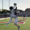 Liberty Christian's Jaylon Hawkins catches a touchdown pass in the Brownwood scrimmage.