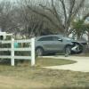 A single-vehicle crash Thursday resulted in a car going through a fence and into a resident’s yard in Grape Creek.