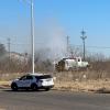 Fire crews responded to a grass fire that broke out in a wooded area on Executive Drive late Monday morning.