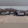 Law enforcement officers surround a vehicle on US Highway 67 near Barnhart after a pursuit ended Sunday afternoon. Reagan County and Irion County deputies detained the suspect without incident, temporarily shutting down the highway. (Photo: Ivan Patiño / The Big Lake Wildcat)