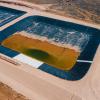 The Texas Railroad Commission approved the construction of produced water ponds to treat and recycle produced water from fracking, next to the Circle 6 Baptist Camp in the Permian Basin. Credit: Julian Mancha for The Texas Tribune/Inside Climate News