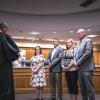 Judge Gonzalo Rios administers the oath of office to newly elected and returning San Angelo ISD trustees, from left: Ami Mizell-Flint, Dr. Taylor Kingman, Karla Cardenas, and Bill Dendle, during the May 19, 2025, board meeting.