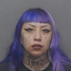 The mother of a San Antonio middle-school student was arrested Monday after she allegedly helped her son plan a school shooting.