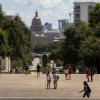 Students walk through campus at the University of Texas at Austin on Aug. 25, 2021.