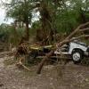 A destroyed vehicle caught in between trees in Hunt, a small town where the the north and south forks of the Guadalupe River meet, about 13 miles west of Kerrville.