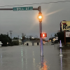 A structure is shown floating down Pulliam Street after heavy flooding in San Angelo on Friday, July 4, 2025.