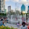 Children play at the Nancy Best Fountain at Klyde Warren Park in downtown Dallas on July 27. The City Council voted this week to end diversity initiatives to keep federal funding.