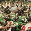 Wall Hawk Head Coach Craig Slaughter leads the teams in prayer