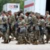 Members of the Texas National Guard assemble in Elwood, Illinois, at the Army Reserve Training Center in the southwest suburb of Chicago on Oct. 7, 2025.