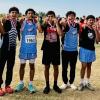 San Angelo TLCA’s Zechariah Cuevas (center) set a school record Wednesday at the District 6-3A Cross Country Meet.