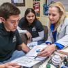 ASU business professor, Dr. Gayle Randall, working with students in her office