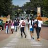Students walk along the Tiger Walk through campus on the first day of class at Texas Southern University on Monday, Aug. 23, 2021.