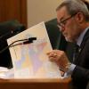 State Sen. Kevin Sparks, R-Midland, looks over a proposed congressional map during a redistricting hearing at the Texas Capitol in Austin on Aug. 6, 2025.