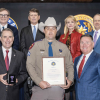 Texas Highway Patrol officer Scott Keane from Big Lake was awarded the Department of Public Safety Purple Heart recently after he was injured assisting during a crash last year.