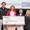 2026 BizPitch winner Audrey Spearman (in pink) with ASU and SBDC representatives