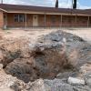 A pit in the parking lot of the First Baptist Church in Grandfalls, where the Railroad Commission plugged a wellbore that had gushed thousands of gallons of wastewater. Grandfalls is southwest of Odessa, between Monahans and Fort Stockton.