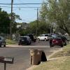 SWAT surrounds a house where barricaded subject is located on June 25, 2026