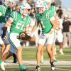 Wall's Krue Thompson celebrates with Christian Camp (1) and Blaize Benson (5) against Ozona on Friday, Sept. 18, 2026.