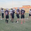 Ballinger's Hunter Kresta celebrates with teammates after a touchdown catch against Brady on Friday, Sept. 18, 2026.