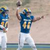 Angelo State's Zach Burton and Caleb Taylor celebrate during the 2026 season.