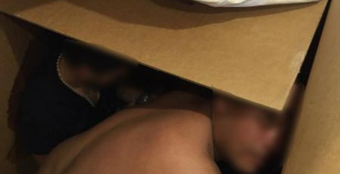 Illegal Aliens Smuggled in Cardboard Boxes.  CBP Image