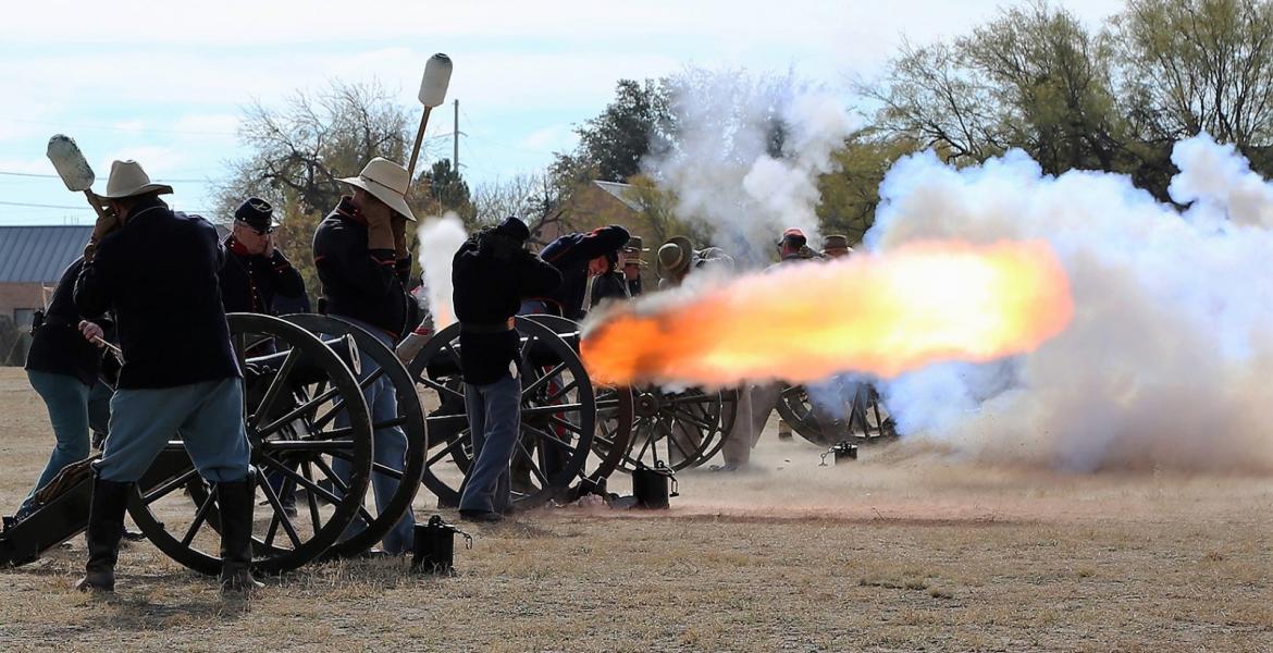 Firing of the cannons at Christmas at Old Fort Concho
