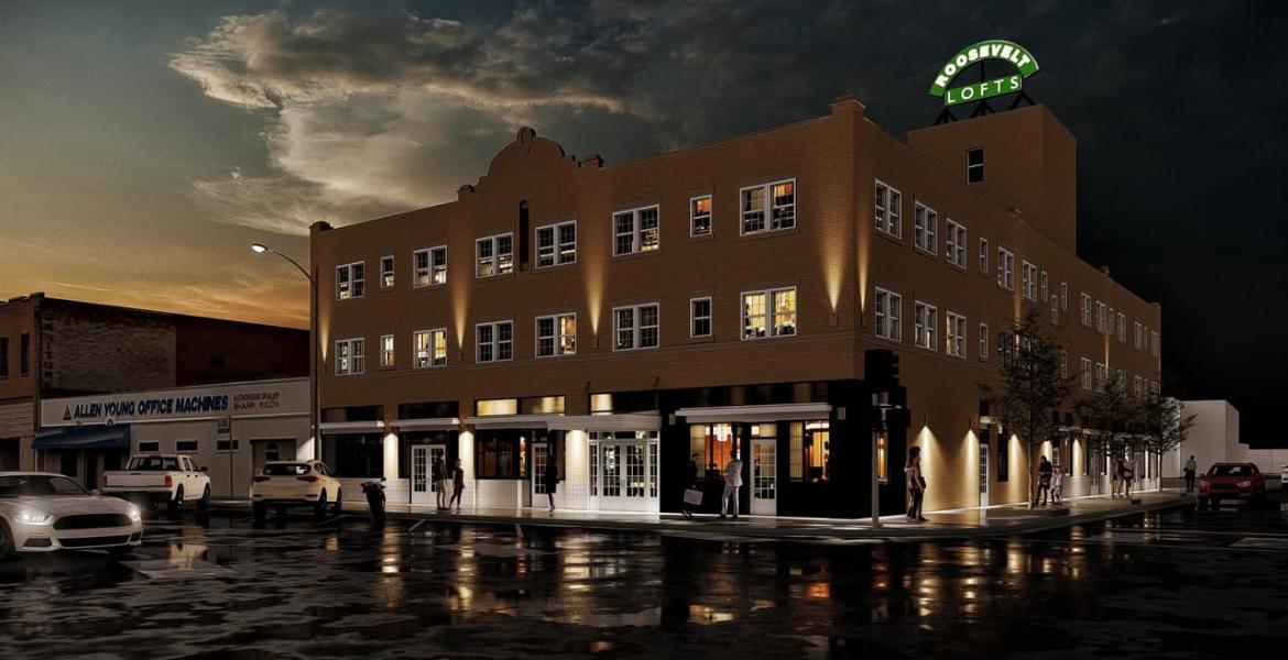 A rendering of the Roosevelt Lofts project in downtown San Angelo showcases the planned architectural lighting and exterior renovations. The historic building, originally constructed in 1929, is being transformed into modern loft apartments as part of a $6.5 million redevelopment led by Overland Property Group. The project is set for completion in late summer 2025. (Courtesy: Roosevelt Lofts / Overland Property Group)